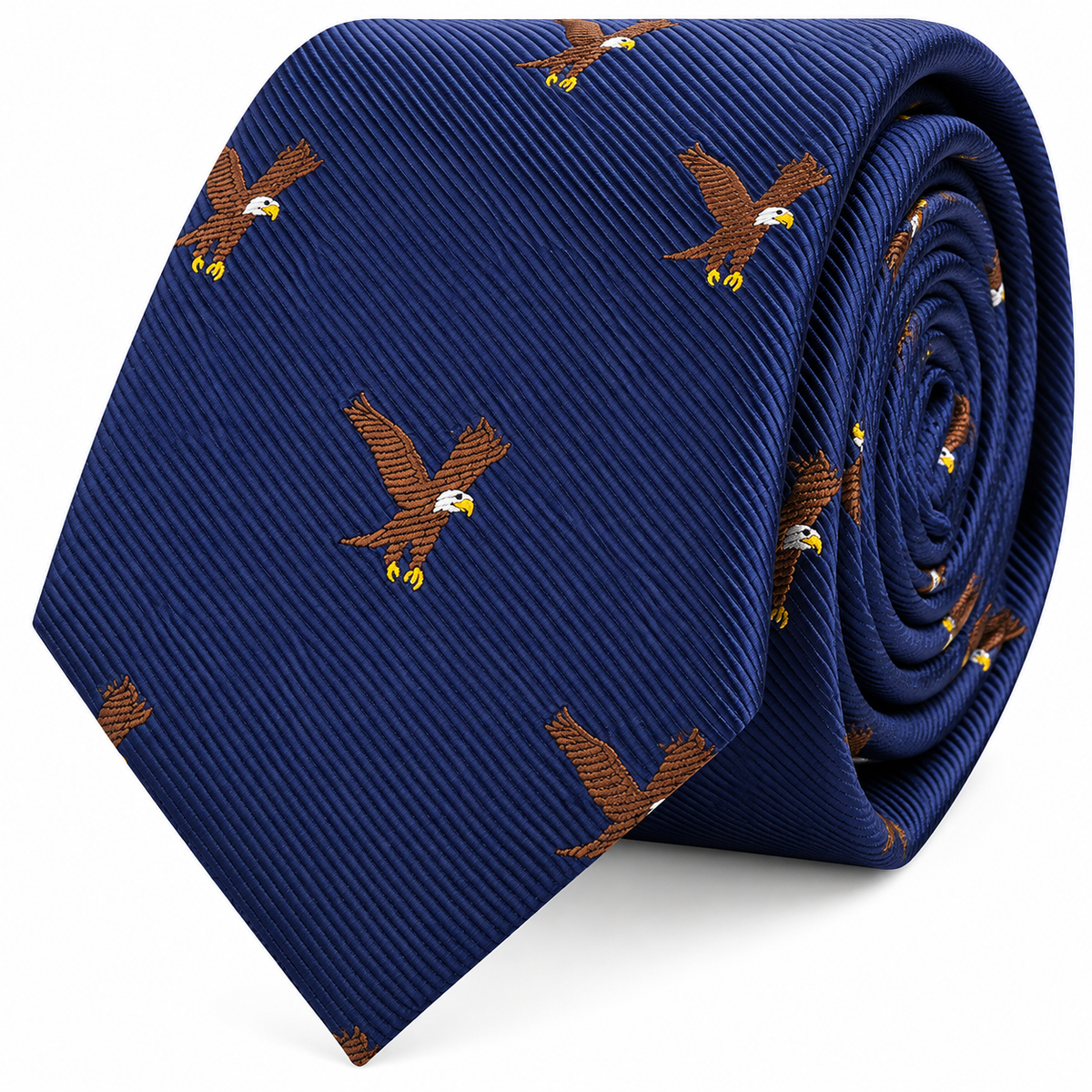 The Eagle Bird Skinny Tie is a blue slim-cut tie, rolled up for display, and features a repeating pattern of embroidered bald eagles in flight.