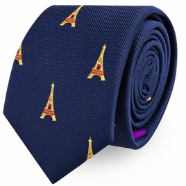 A rolled navy blue Eiffel Tower Skinny Tie featuring a repeating Eiffel Tower pattern.