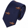 The Equestrian Skinny Tie is shown rolled up against a white background, featuring a navy blue color with a repeating pattern of embroidered brown horses and riders.