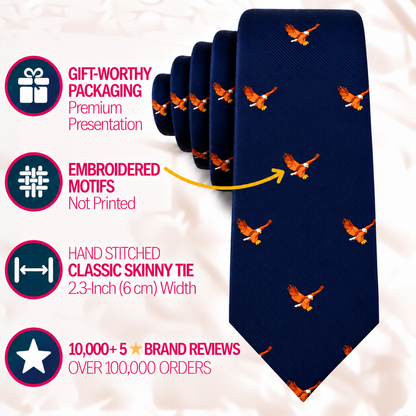 A navy blue Flying Eagle Skinny Tie with an eagle motif, featuring text callouts for gift packaging, embroidered details, a 2.3-inch width, and brand review statistics.