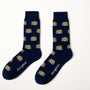 A pair of Gamer DJ Socks in navy blue, featuring repeating yellow and white wildcat faces and white cursive text by the toes, displayed against a white background.
