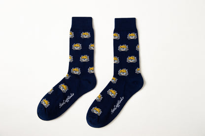 A pair of Gamer DJ Socks in navy blue, featuring repeating yellow and white wildcat faces and white cursive text by the toes, displayed against a white background.