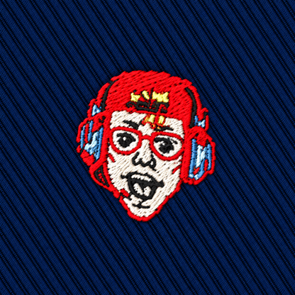 An embroidered patch of a stylized face wearing red headphones and glasses on a navy blue diagonal-ribbed Gamer Face Skinny Tie.
