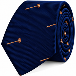 Gavel Skinny Tie in dark blue featuring a repeating pattern of small gold-tone gavels.
