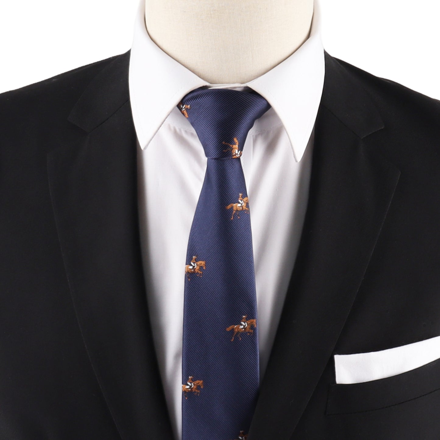 A mannequin wears a black suit, white shirt, Giddy Up Horse Racing Skinny Tie in navy featuring small horse rider patterns, and a white pocket square—perfect for adding standout derby day style.