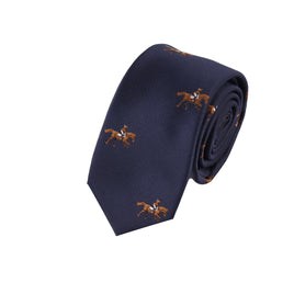 The Giddy Up Horse Racing Skinny Tie is a navy blue tie featuring a repeating pattern of small brown horses and riders, shown rolled up against a white background.