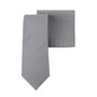 The Grey Cotton Skinny Tie & Pocket Square Set, displayed on a white background, offers a versatile combo for any occasion.