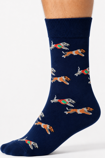 A person's lower leg is shown wearing Greyhound Racing Socks in navy blue, featuring a pattern of racing greyhounds in vibrant jackets.