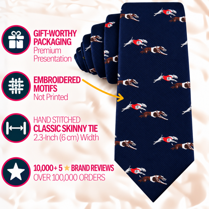 Greyhound Racing Skinny Tie in dark blue with a repeating dog pattern, featuring hand-stitched construction, embroidered motifs, and gift-worthy packaging.