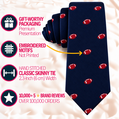 Gridiron Skinny Tie in navy blue with a red and white pattern, 2.3 inches wide with embroidered football motifs, packaged for gifting.
