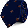 A coiled navy blue Grizzly Bear Skinny Tie featuring a repeating pattern of brown bear heads.