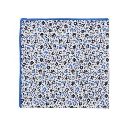 A black light blue floral pocket square featuring a Midnight backdrop.