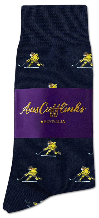The Ice Hockey Shot Socks feature a navy blue base with repeating yellow kangaroos and come in purple AusCufflinks Australia packaging—ideal for fans who love hockey energy and goal-getter vibes.