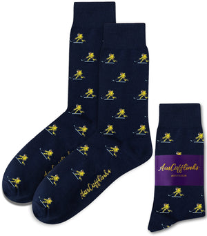 Ice Hockey Shot Socks in navy blue feature yellow cartoon skiers and come shown both laid flat and packaged with a purple "AusCufflinks Australia" label—perfect for adding hockey-inspired style to your daily outfit.