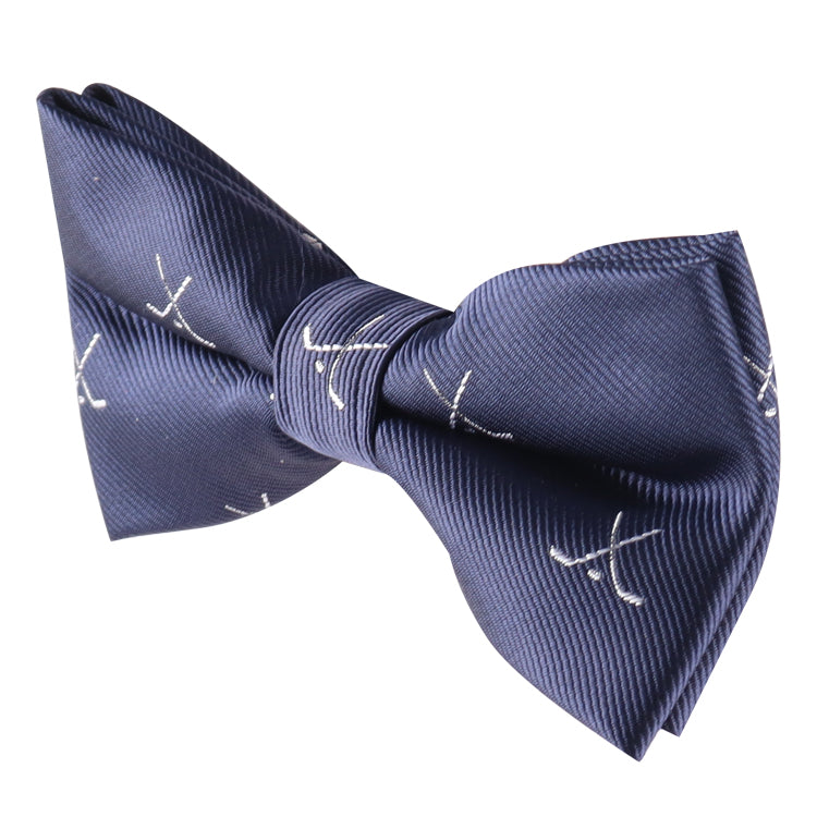 The Ice Hockey Cross Bow Tie is a navy blue accessory with a subtle diagonal weave and small white crossed golf club motifs—an ideal gift for fans of both ice hockey and golf.