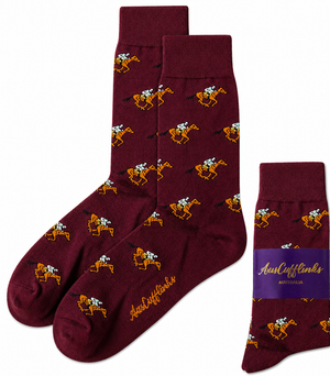 Horse Racing MAROON Socks with a repeating camel and rider pattern, plus one folded sock labeled "AussieCufflinks AUSTRALIA"—a unique gift for jockeys or horse racing enthusiasts.