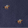 The Horse Racing Skinny Tie features navy blue fabric with small, embroidered brown horses and jockeys in blue shirts, arranged in a diagonal pattern—perfect for anyone who loves elegant equestrian style.