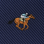 The Horse Racing Skinny Tie features an embroidered design of a jockey riding a horse on blue textured fabric, making it the perfect accessory for any equestrian enthusiast or horse racing fan.