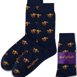 Melbourne Race Horse Socks: Navy blue socks featuring orange racehorses and jockeys, showcased with a purple AusCufflinks Australia label—an ideal gift for racing enthusiasts.
