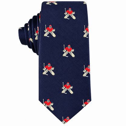 Upgrade your style with the Ice Hockey Goalie Skinny Tie—an elegant navy blue necktie featuring a repeating pattern of ice hockey goalies in red jerseys, beige pants, and helmets with sticks. This unique accessory is perfect for any sports fan or as an exceptional hockey goalie gift for those who appreciate distinctive men’s hockey apparel.