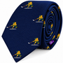 The Ice Hockey Shot Skinny Tie is a navy blue necktie with a repeating pattern of yellow bears playing hockey with white sticks—making it the perfect gift for hockey lovers or a great addition to any men’s hockey apparel collection.