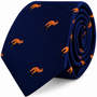 A rolled Kangaroo Skinny Tie in navy blue featuring a repeating pattern of small orange kangaroos.