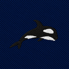 An embroidered orca on a navy blue diagonal-ribbed Killer Whale Skinny Tie.