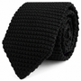 The Black Knitted Skinny Tie is displayed rolled up against a white background.