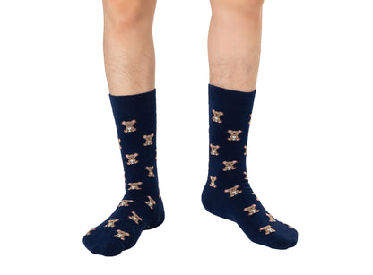 Wearing dark blue Koala Socks decorated with teddy bear patterns showcases an adorable style, perfect for those who love a cute touch to their outfit.