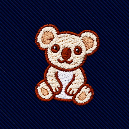 Koala Skinny Tie featuring an embroidered patch of a smiling koala on a dark blue ribbed fabric.