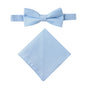 The Light Blue Cotton Bow Tie & Pocket Square Set is showcased against a white background, providing a refreshing touch perfect for spring.