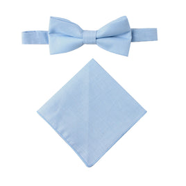 The Light Blue Cotton Bow Tie & Pocket Square Set is showcased against a white background, providing a refreshing touch perfect for spring.