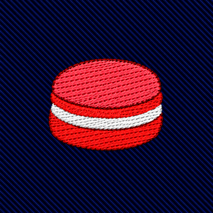 Macaron Skinny Tie featuring an embroidered red and white macaron icon for dessert lovers on a dark blue ribbed background.