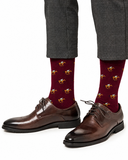 A person wears brown dress shoes, gray plaid trousers cropped above the ankles, and Horse Racing MAROON Socks featuring a dog motif—an ideal choice for anyone searching for unique jockey gifts.