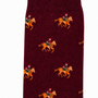 Close-up of Maroon Thoroughbred Horse Racing Socks, featuring a repeating pattern of a rider in a Santa hat on horseback.