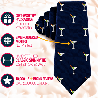 A navy blue Martini Skinny Tie featuring an all-over martini glass pattern, with infographic callouts describing its gift packaging, embroidered motifs, 2.3-inch width, and positive customer reviews.