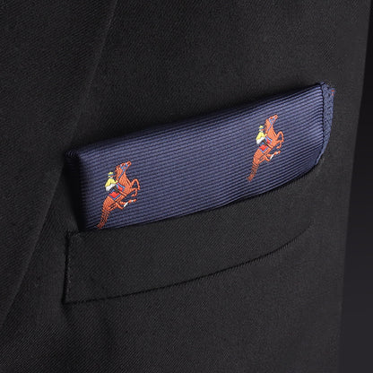 The Melbourne Race Horse Pocket Square in navy blue with red horse embroidery adds a stylish race-day touch to a black suit jacket—perfect as a Melbourne Cup accessory.