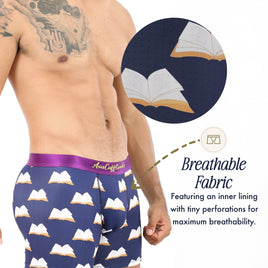 A man models Book Underwear featuring a navy design with an open book pattern—ideal for book lovers. An inset displays small fabric perforations, emphasizing the underwear's breathability and literary flair.