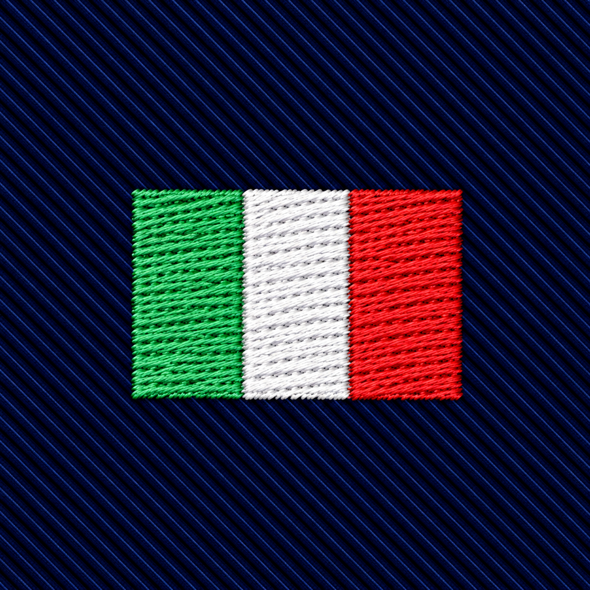 A Mexican Italian Flag Skinny Tie featuring an embroidered Italian flag on a dark blue ribbed heritage skinny tie.