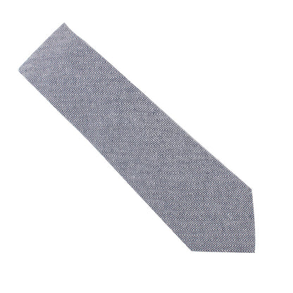 A navy tie with a sophisticated herringbone pattern on a white background.