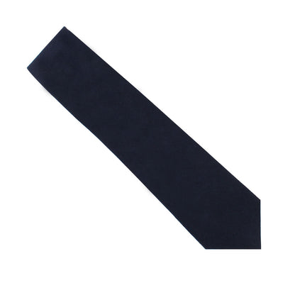 A Navy Cotton Business Tie & Pocket Square Set on a white backdrop effortlessly creates lasting impressions.