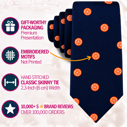 Navy blue Orange Skinny Tie with orange fruit slice motifs and a 2.3-inch width.
