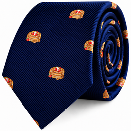A navy blue Pancakes Skinny Tie featuring a repeating pattern of pancake stacks topped with strawberries.