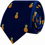 Pineapple Skinny Tie in navy blue featuring an embroidered pattern of yellow pineapples.