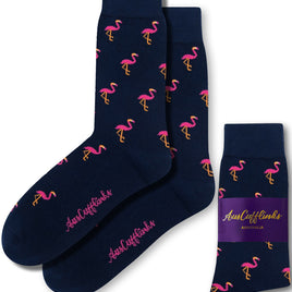 The Pink Flamingo Socks, adorned with charming pink flamingo patterns against a navy blue background, bring a whimsical touch to your sock collection, complete with an "AusCufflinks Australia" label.