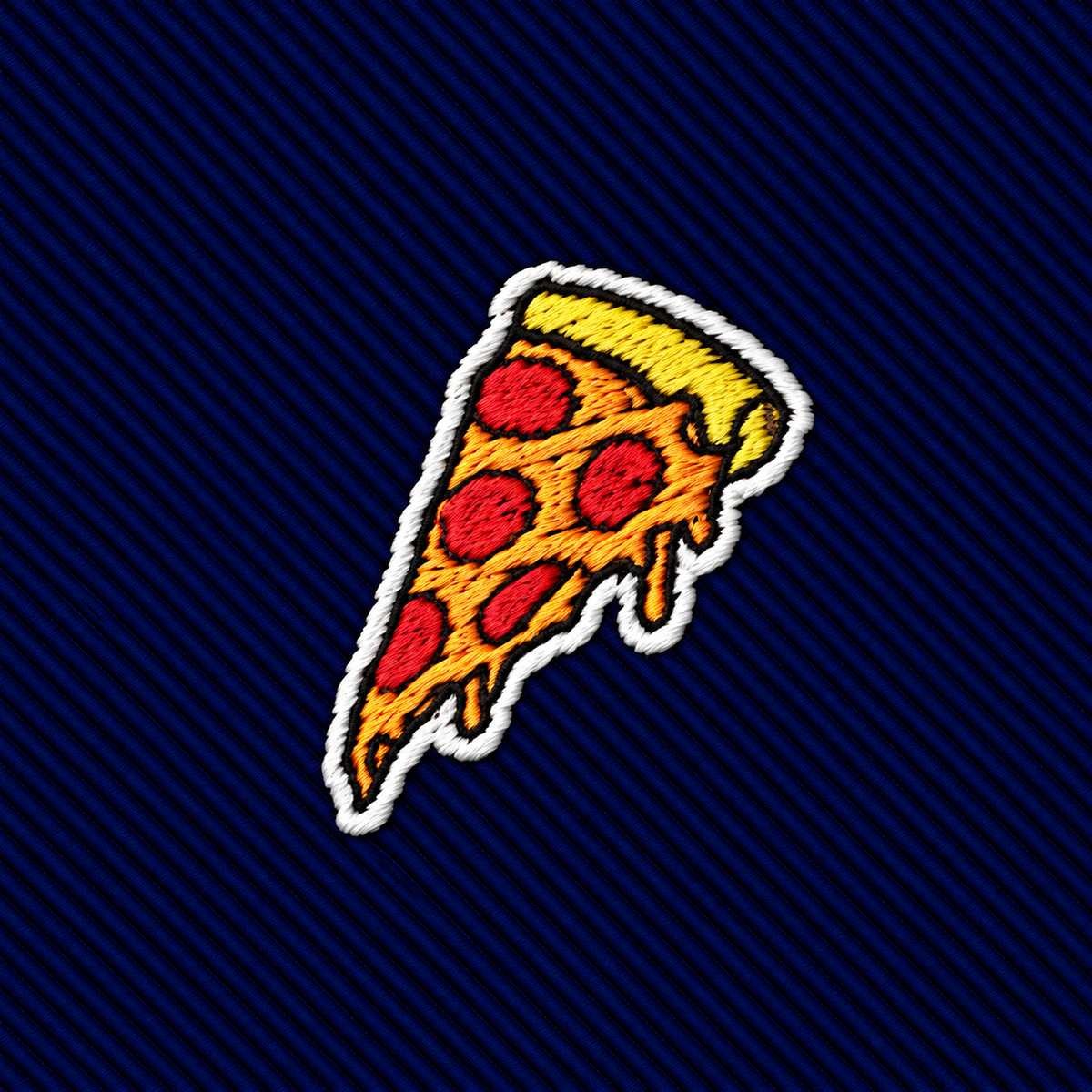Pizza Skinny Tie featuring an embroidered pepperoni pizza slice patch on a blue diagonal-striped background.