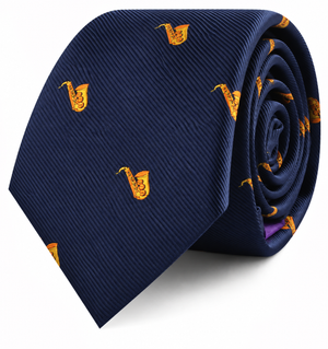 A Saxophone Skinny Tie in navy blue, featuring a pattern of small, embroidered yellow saxophones and rolled up on a white background—an ideal gift for any saxophone enthusiast.