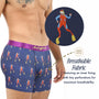 A man wears Scuba Diver Underwear featuring a navy body, purple waistband, and tiny perforations visible in a close-up, emphasizing its breathability and marine-inspired style.