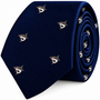 A coiled navy blue Great White Shark Skinny Tie featuring a repeated pattern of small, embroidered sharks.