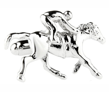 A pair of Jockey Cufflinks captures the essence of a jockey in mid-gallop, embodying sartorial greatness with their exquisite detailing.